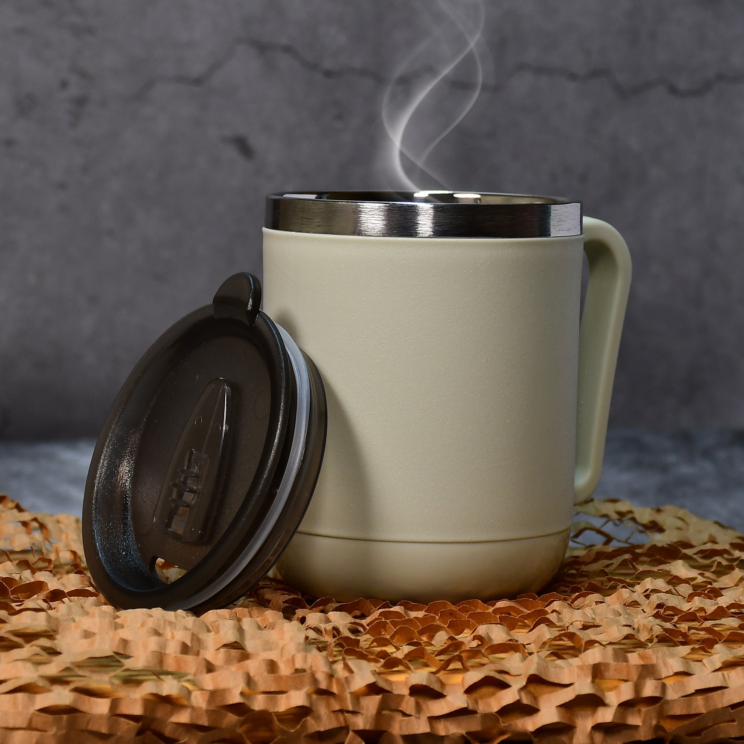 Ganesh Premium Stainless Steel Coffee Mug with heat resistant mug lid. Approx 400Ml mug.