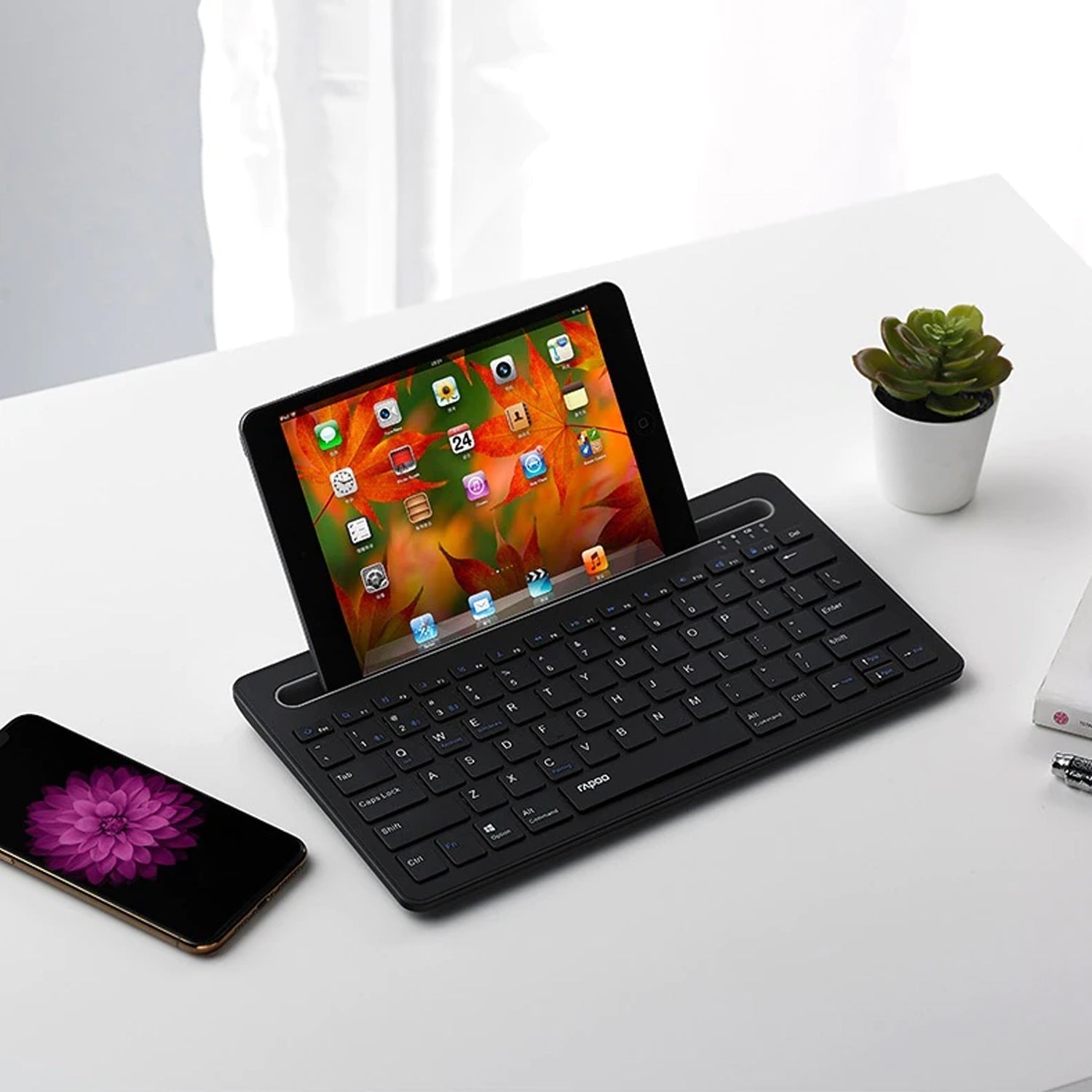 Wireless Mini Keyboard for PC, tablet and phones to control them remotely.