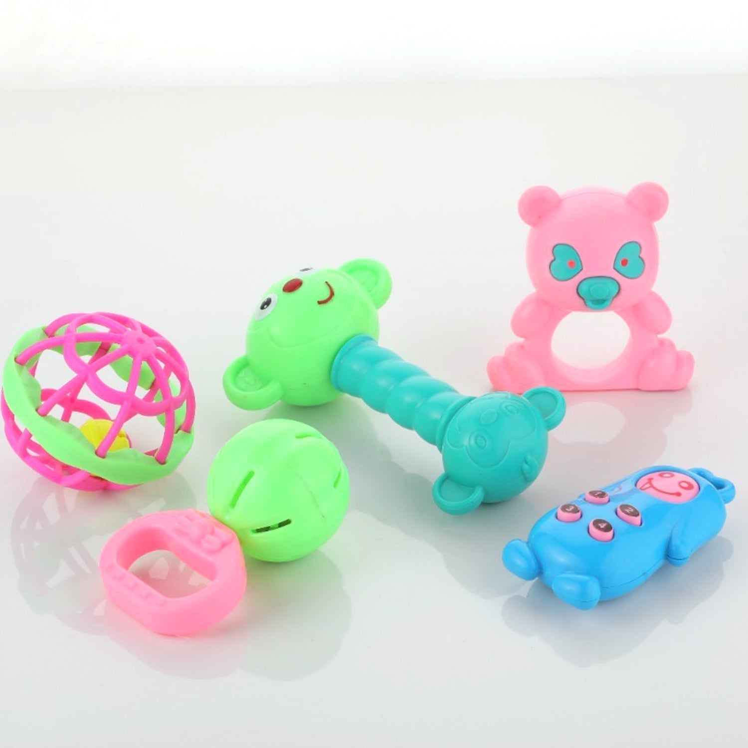 AT38 5Pc Rattles Baby Toy and game for kids and babies for playing and enjoying purposes.