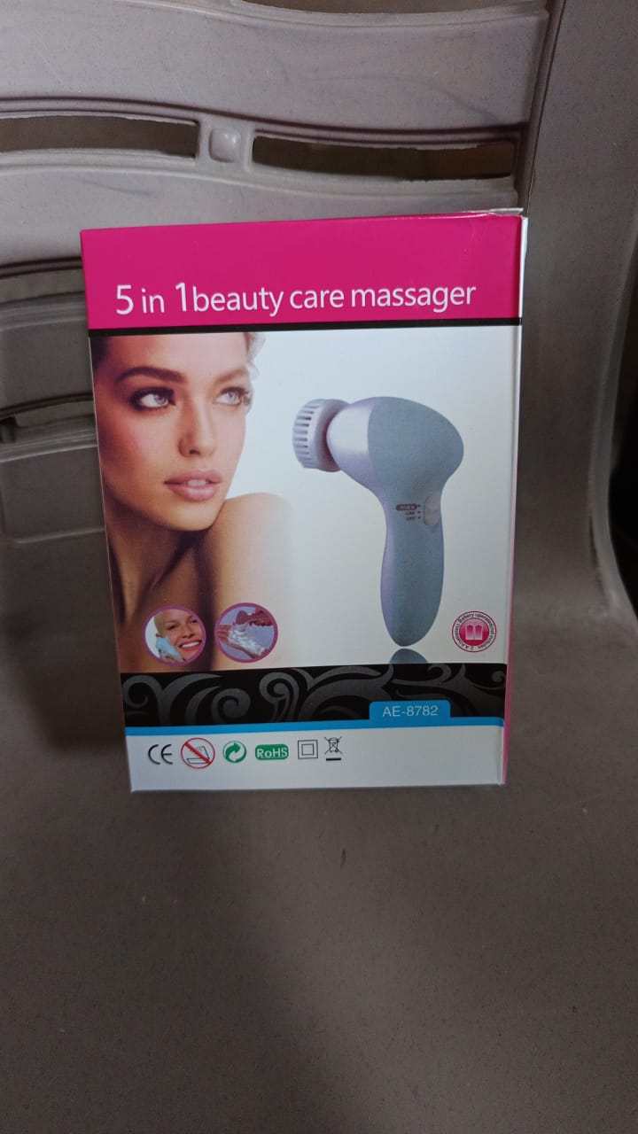 5-in-1 body and facial massager in pink.