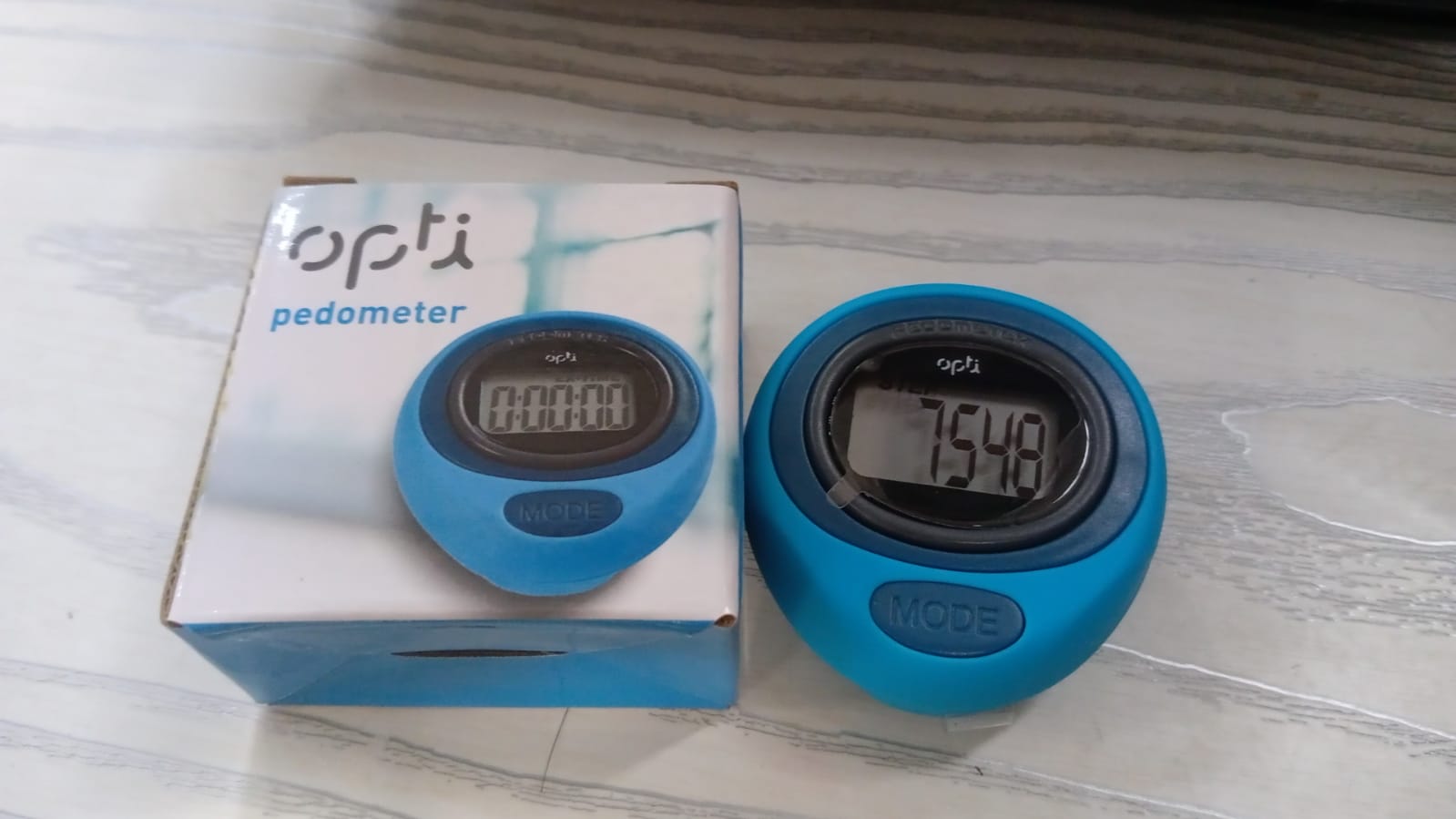 Digital pedometer for tracking steps, calories, distance, speed, and duration during fitness activities.